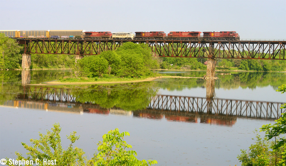 Train with five locomotives including F3A on bridge