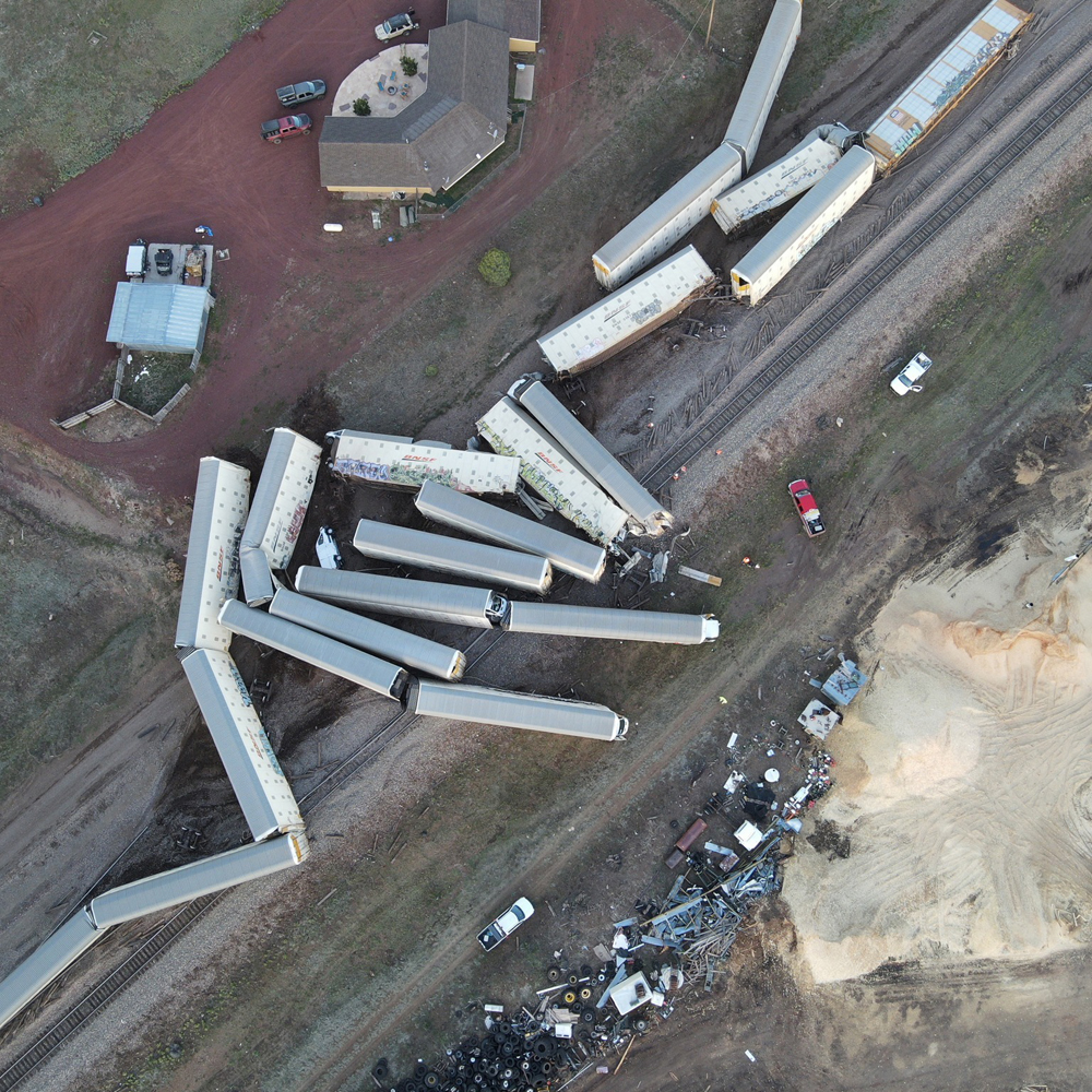 Aerial view of derailed auto racks