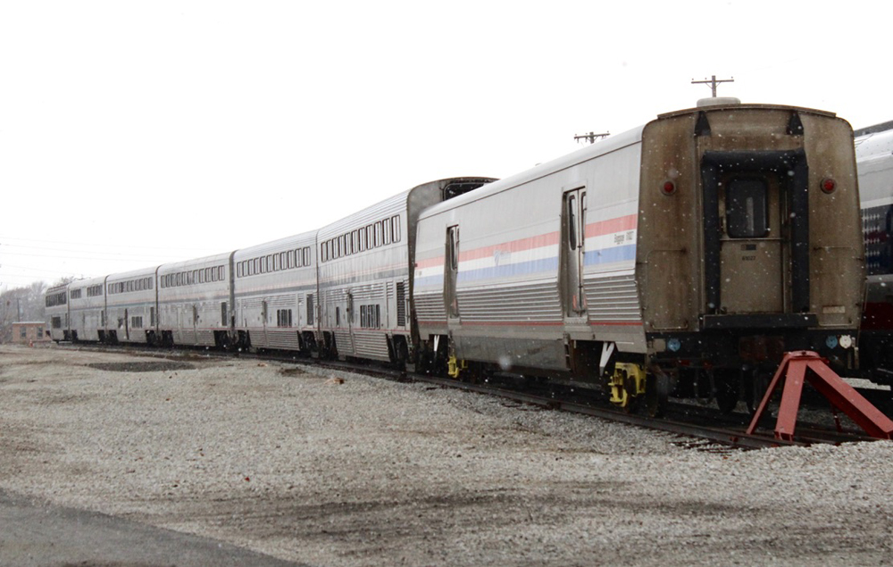 String of passenger cars on siding