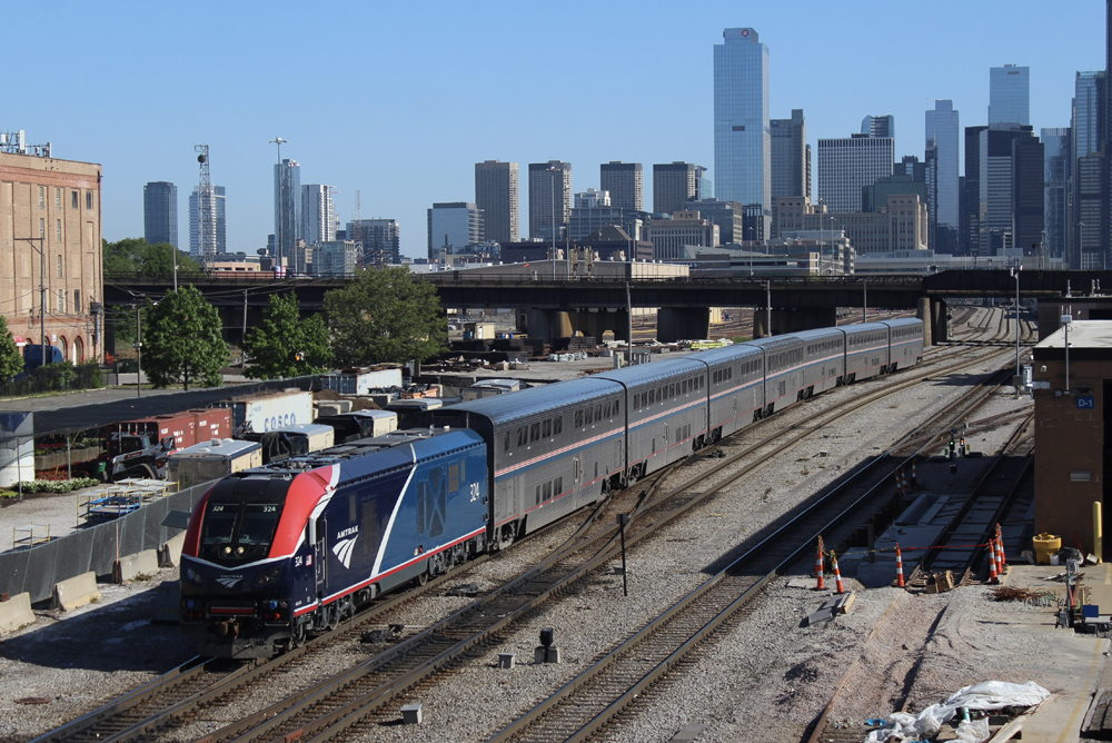Passenger train with Chicago skyline in background