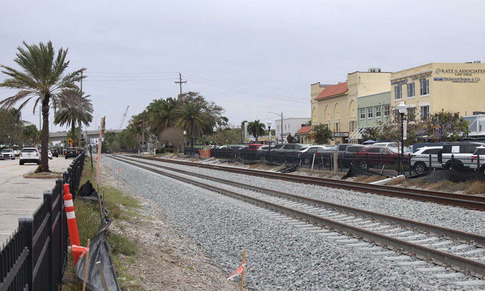 Two-track railroad main line in downtown area of Florida city