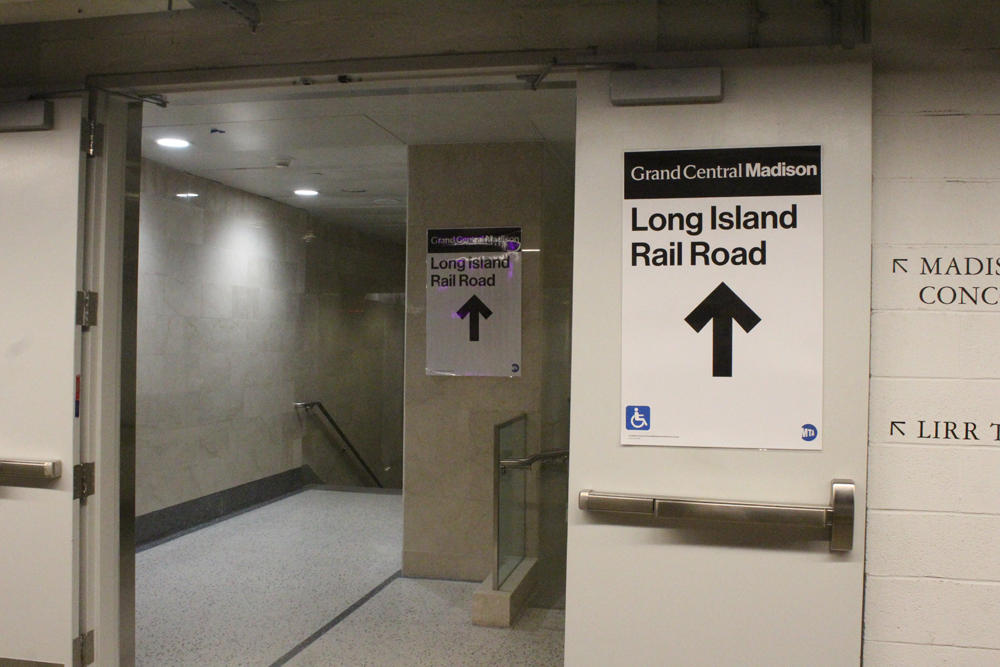 Signs on doors and in hallway for "Long Island Rail Road"