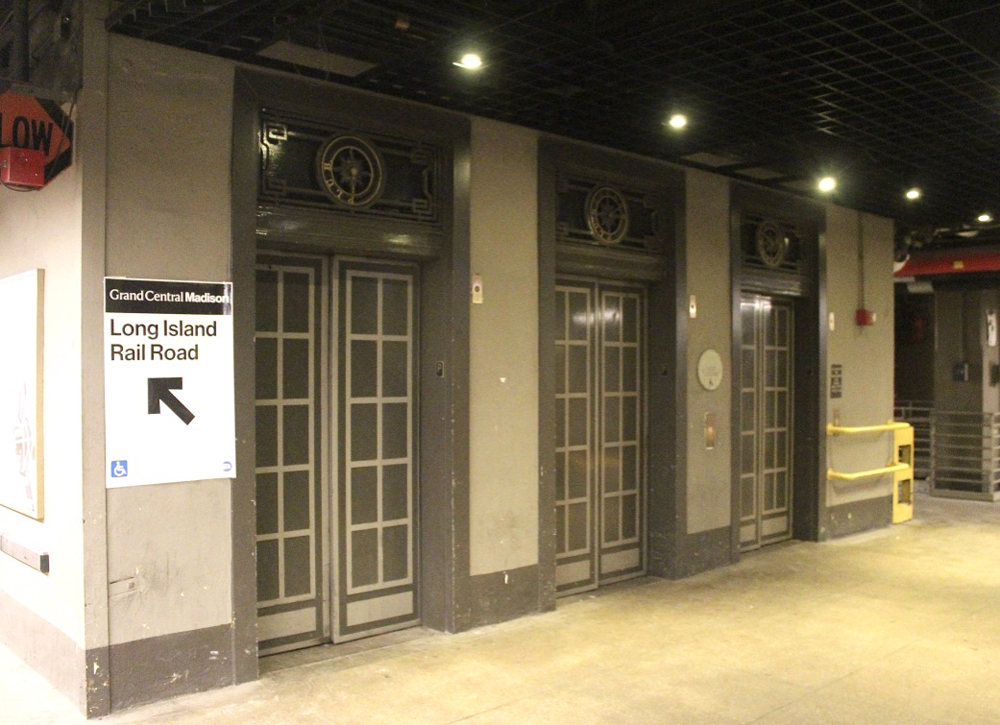 Elevators next to sign pointing to "Long Island Rail Road"