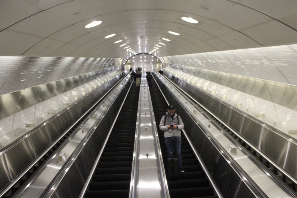 View looking up long escalators