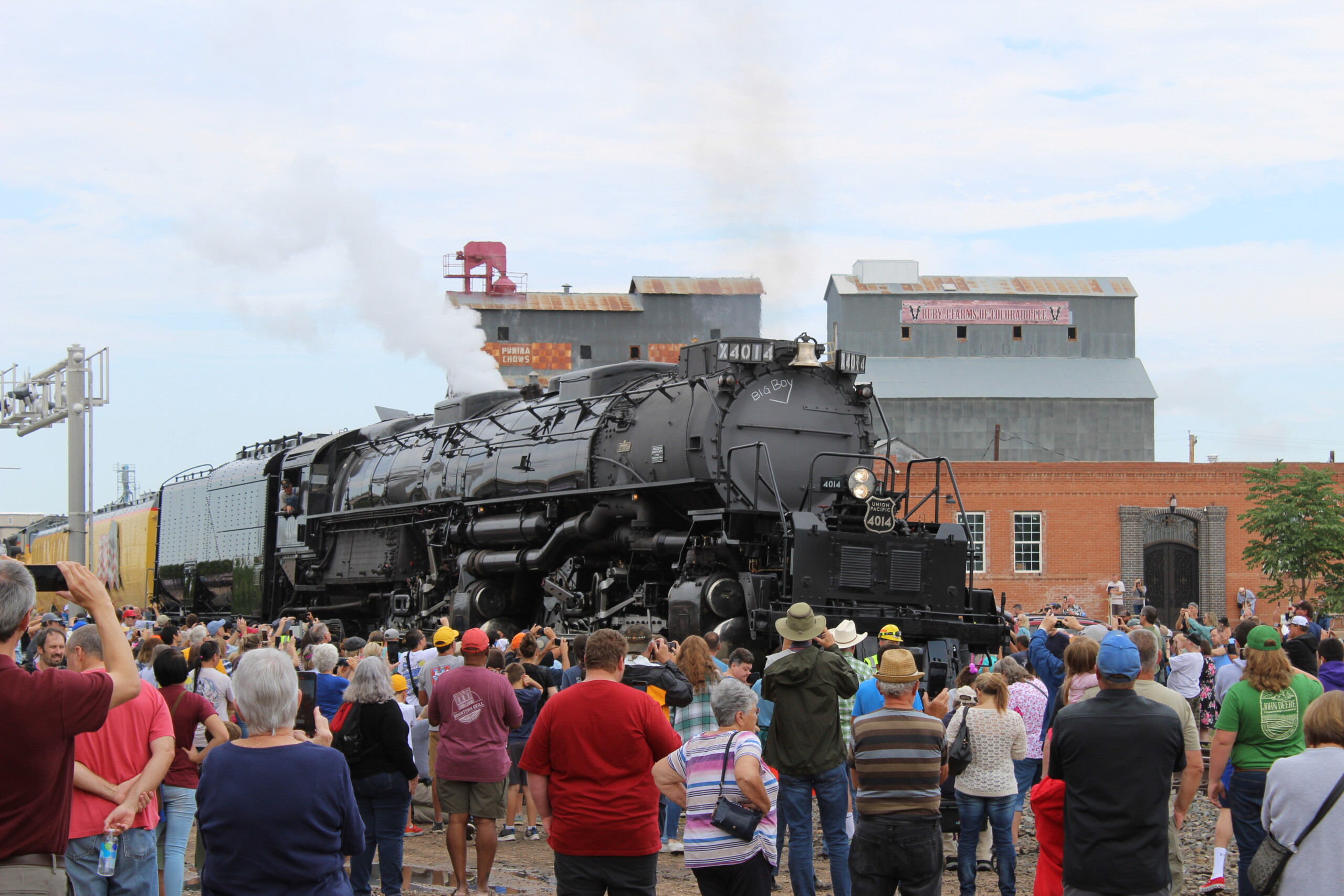 Big Boy No. 4014 steam locomotive in a larger crowd. Five mind-blowing facts — steam locomotives.