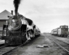 Example of steam Algoma Central locomotives with passenger train by station