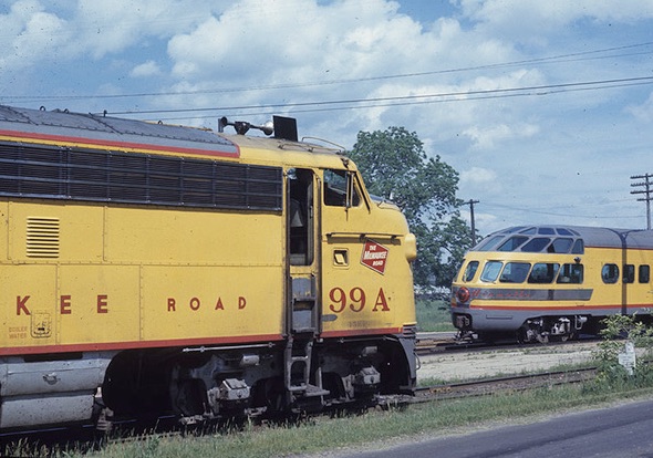 Yellow passenger trains' front and rear