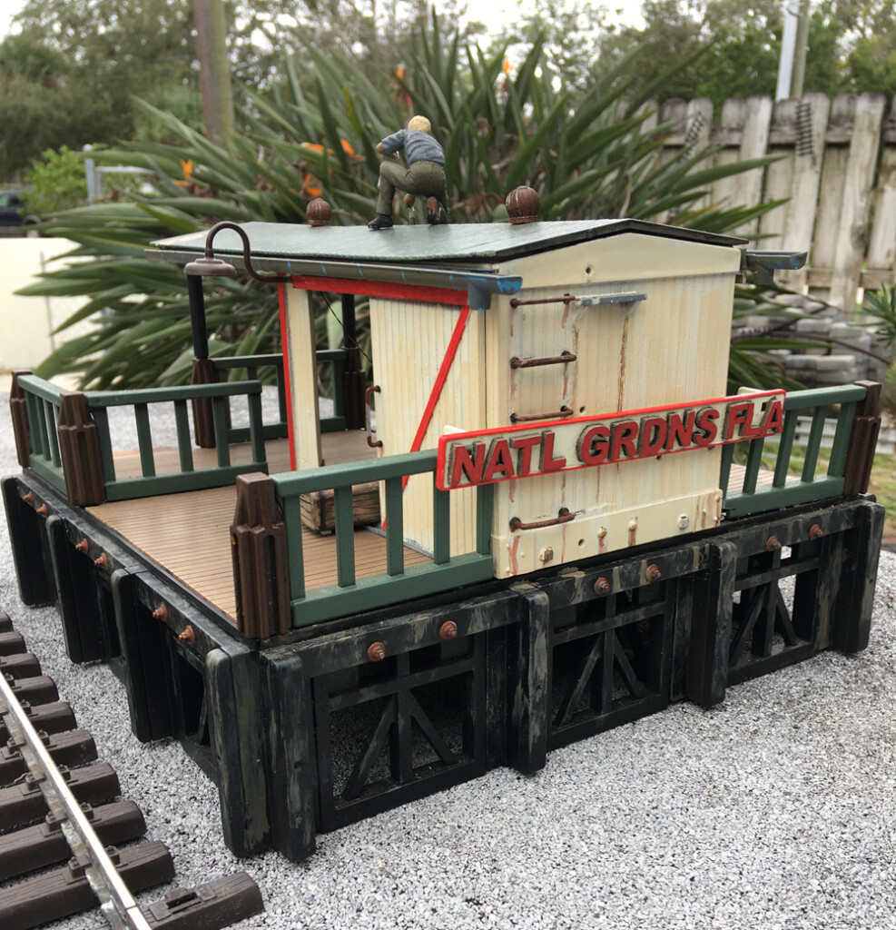 model of freight house on garden railway