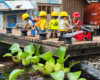 group of construction figures on a model dock