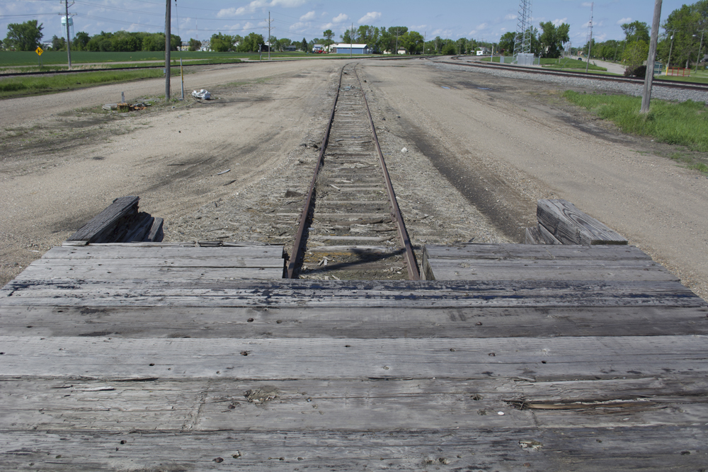 Color image of lightly ballasted track taken from loading dock.