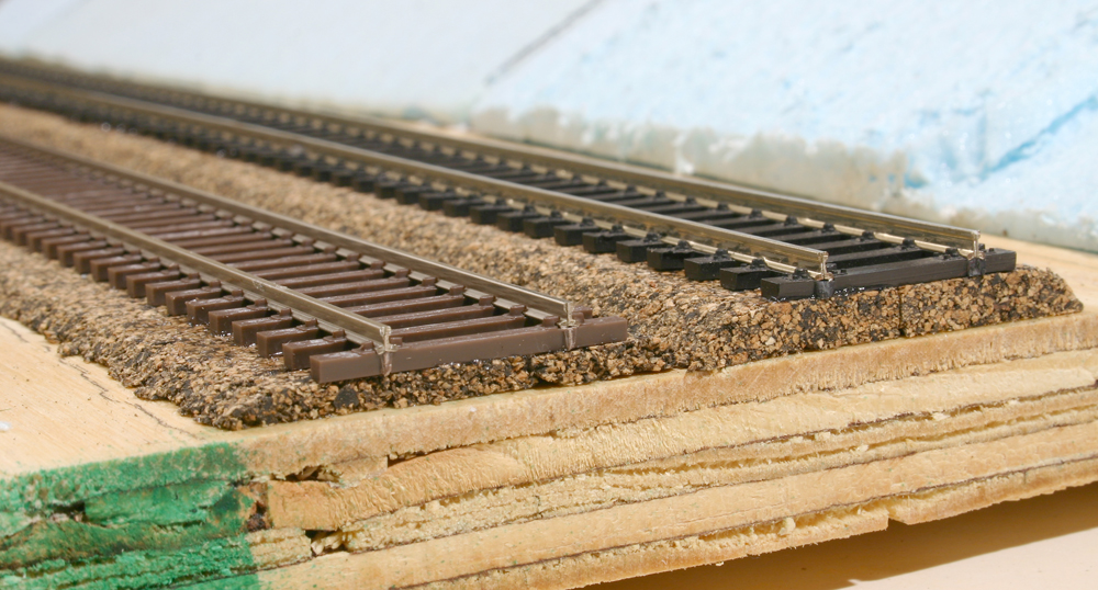 Color photo of HO scale track laid on cork roadbed. 