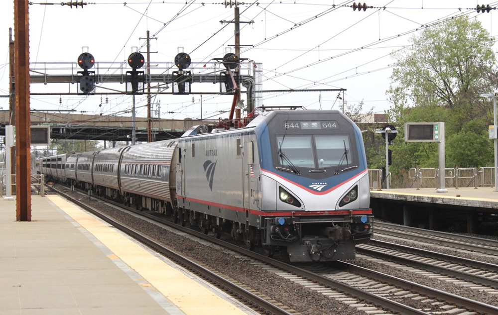 Passenger train with electric locomotive