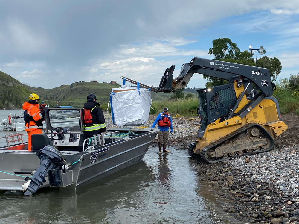 Container removed from boat by tractor