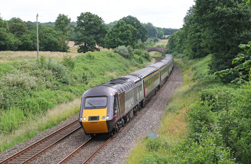 High-speed passenger train in British countryside