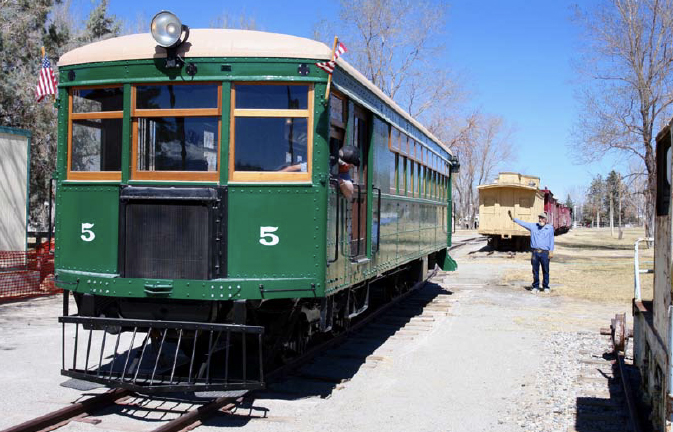 Green railcar at museum
