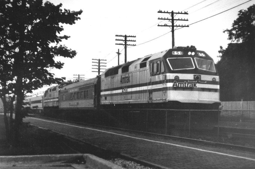 Amtrak train with pug-nosed diesel leading