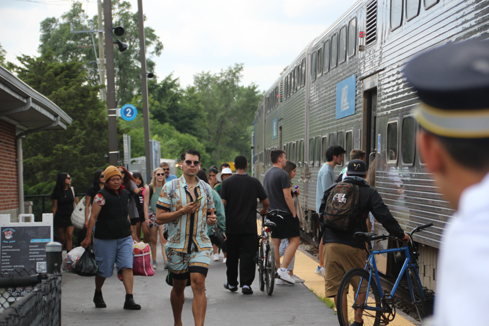 Passengers boarding commuter train