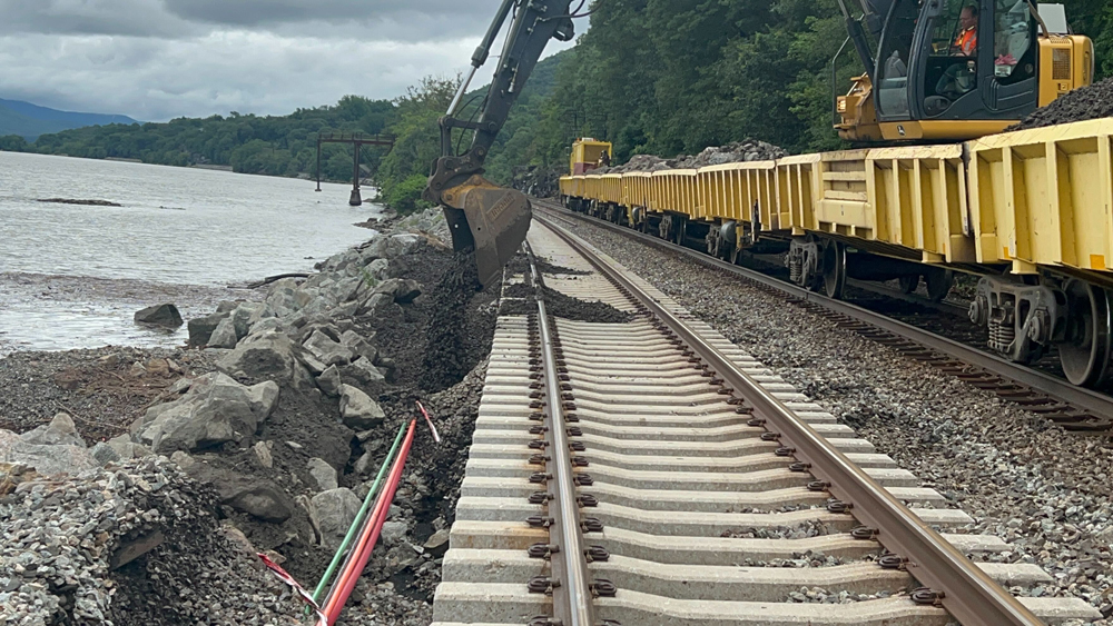 Rocks being dumped along rail line