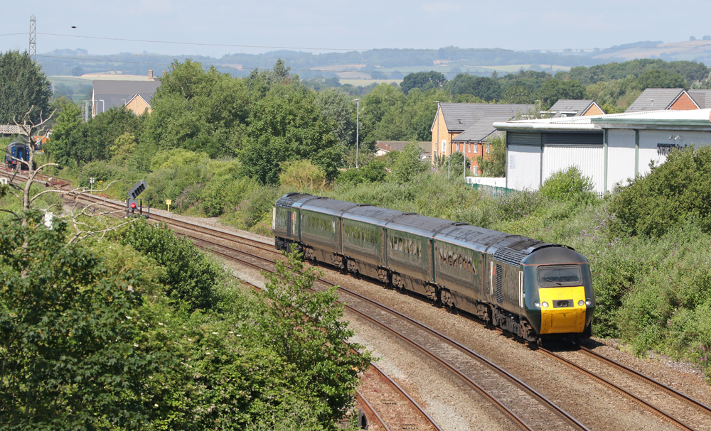 Diesel powered British passenger train on mild curve