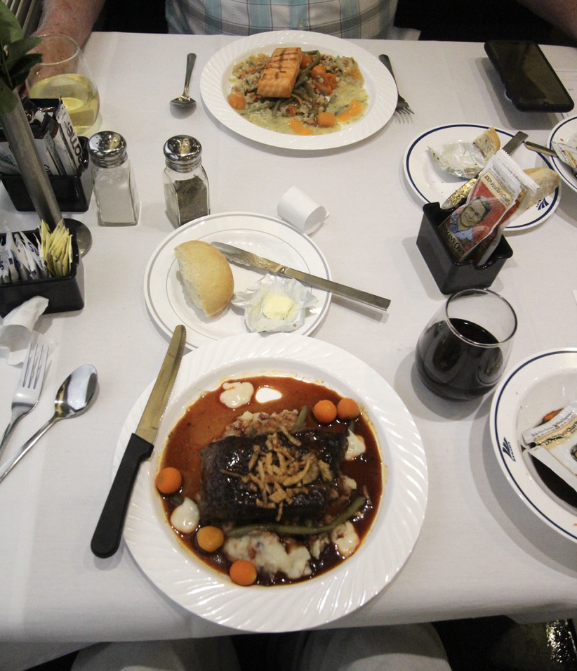 Two meals on table in dining car