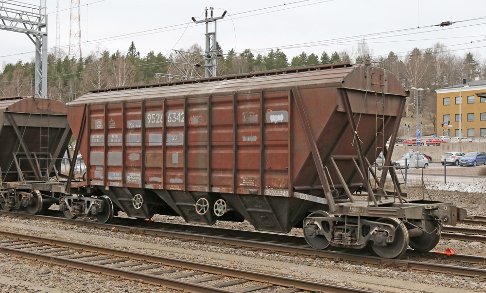 Brown waffle-sided covered hopper