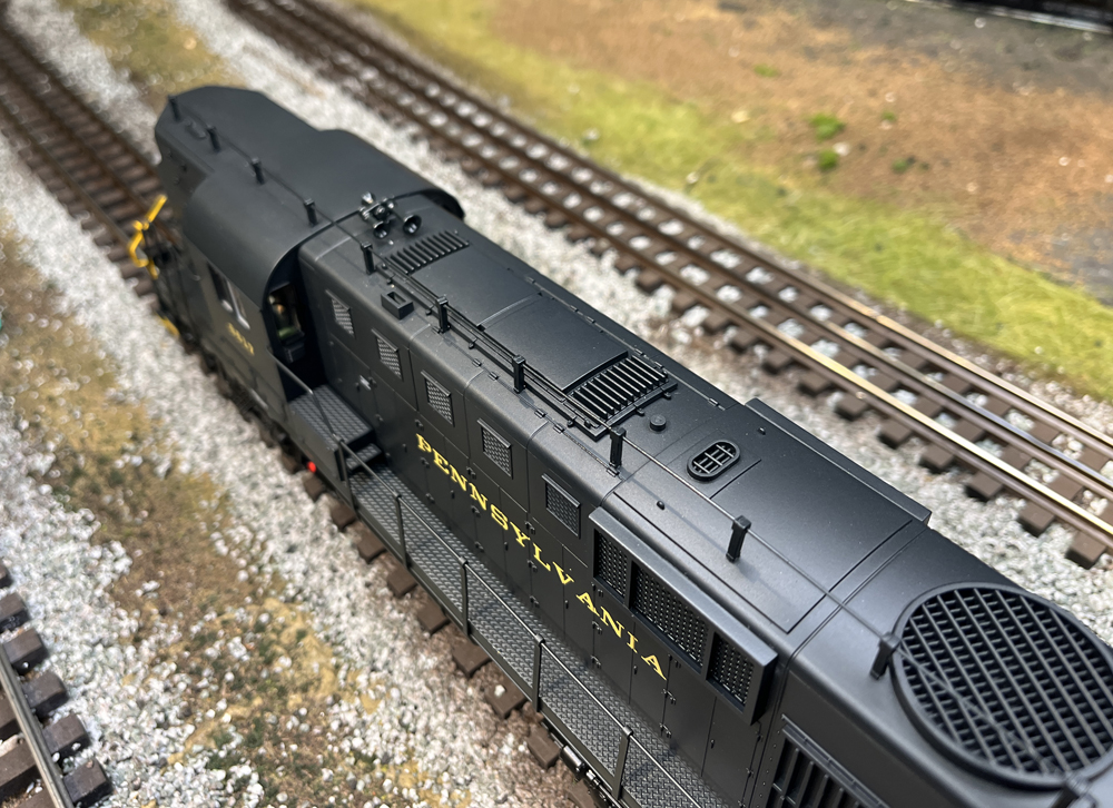 top of a dark green model engine