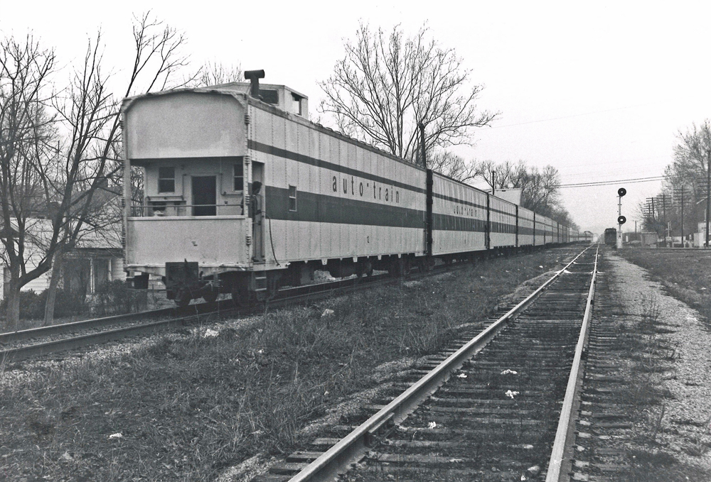 Auto-Train auto rack car with caboose coupla.