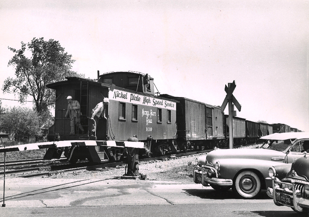 Nickel Plate Railroad caboose at rear of freight train. Five-mind blowing facts — cabooses.