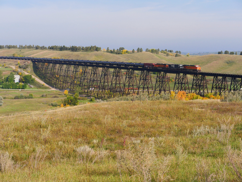 Oil train on bridge as seen from hillside