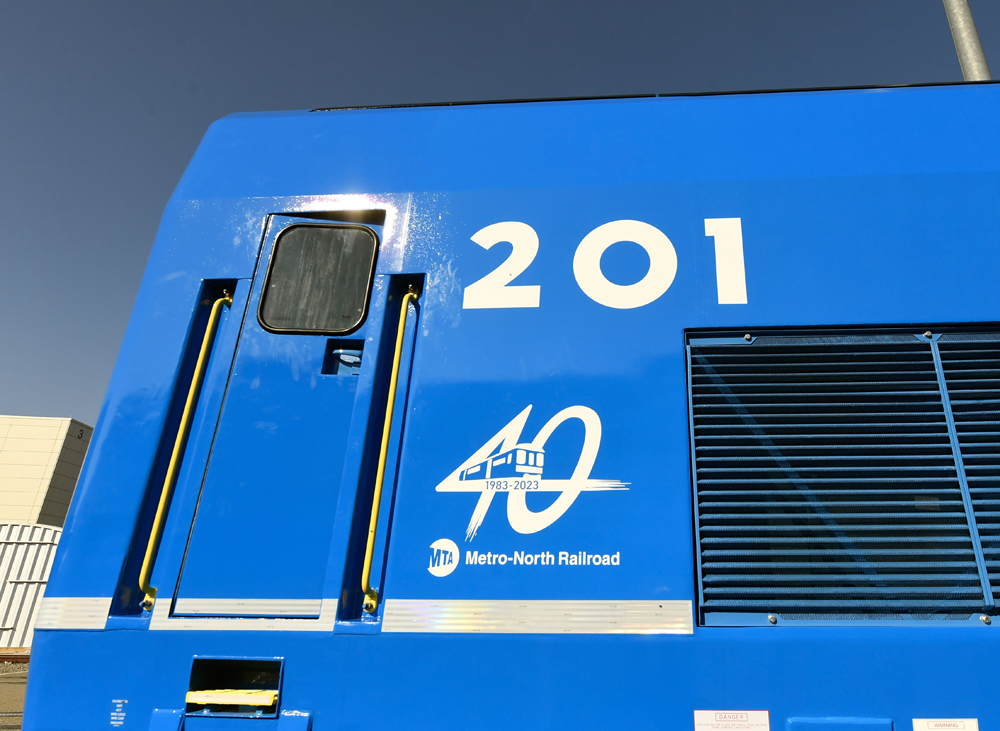 Close-up of Metro-North 40th-anniversary logo on side of locomotive