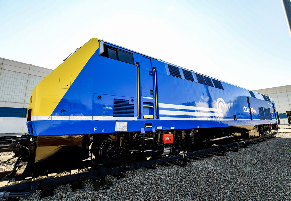 Blue locomotive with yellow nose