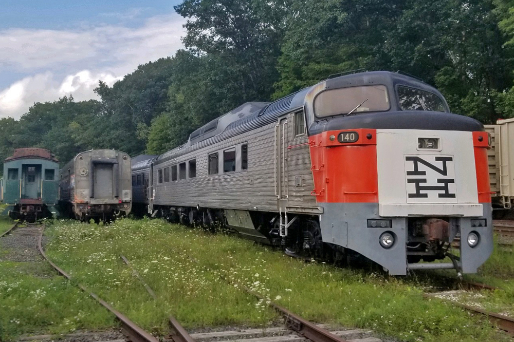 RDC car with locomotive-style nose in yard of museum