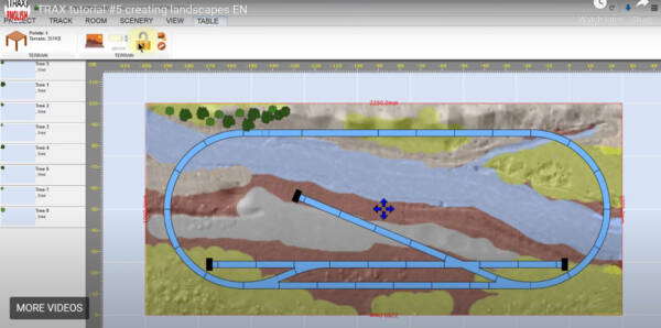 A screen shot of Trax showing scenery being applied to a track plan