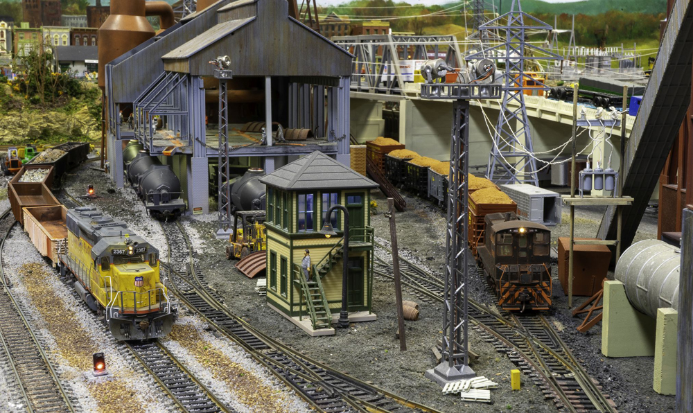 The Grand Strand Western Railroad layout: A model railroad layout with multiple locomotives in the image