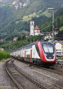 Red, white, and black Swiss bi-level train