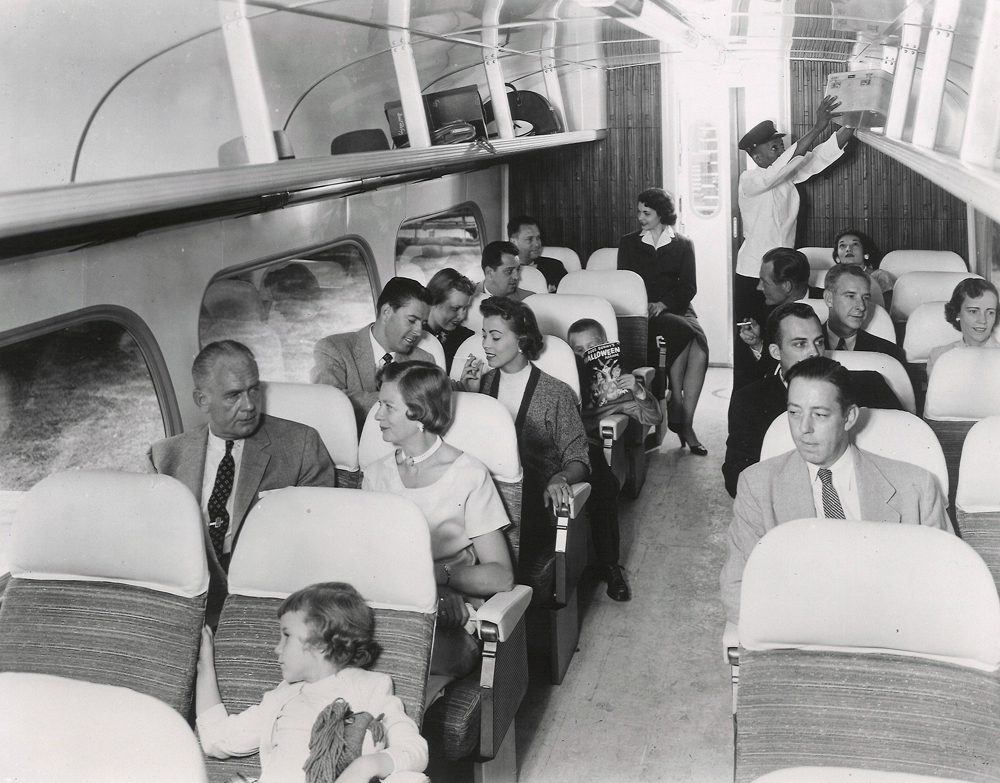 interior of Aerotrain coach with passengers.