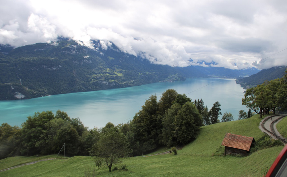 View of mountains, lake, and clouds