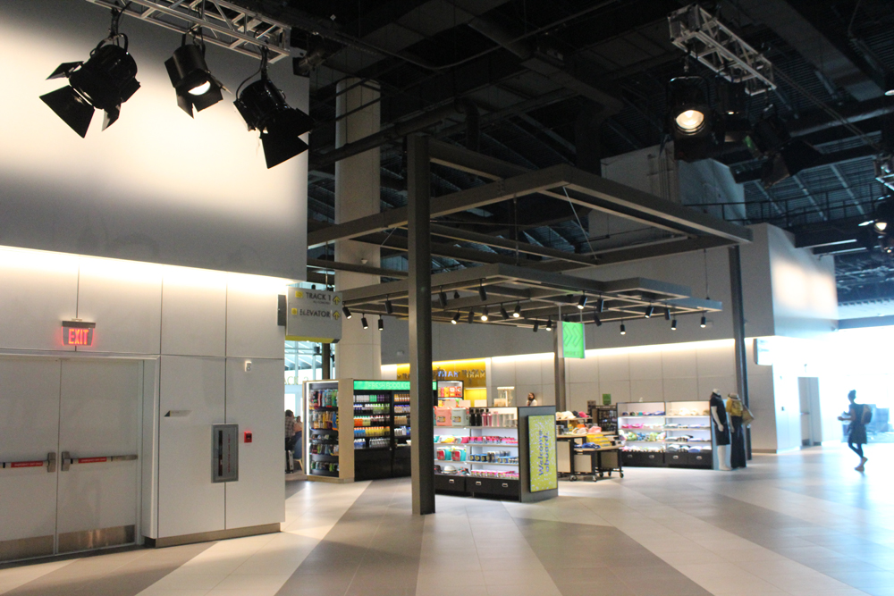 Stage lighting visible in terminal building