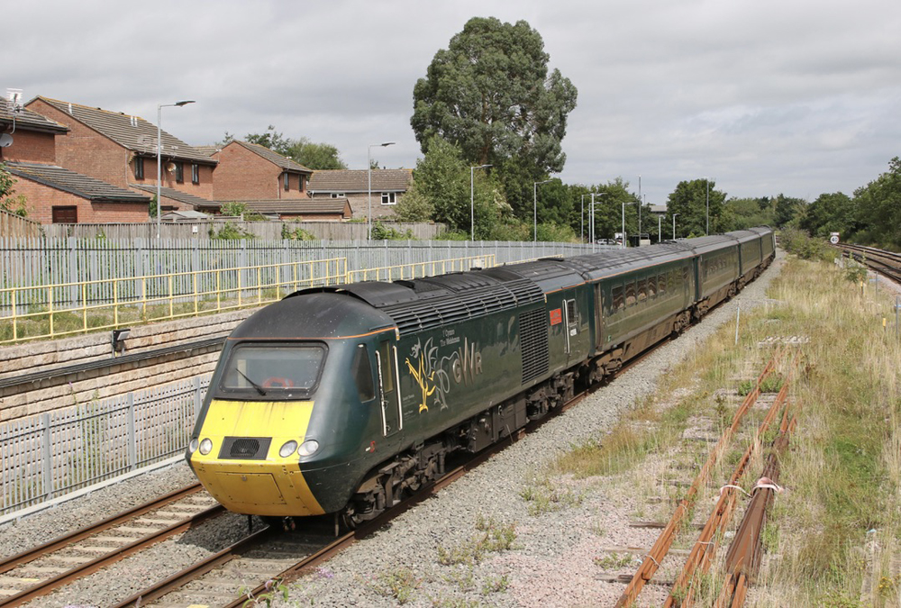 Green British diesel trainset with yellow nose on power car