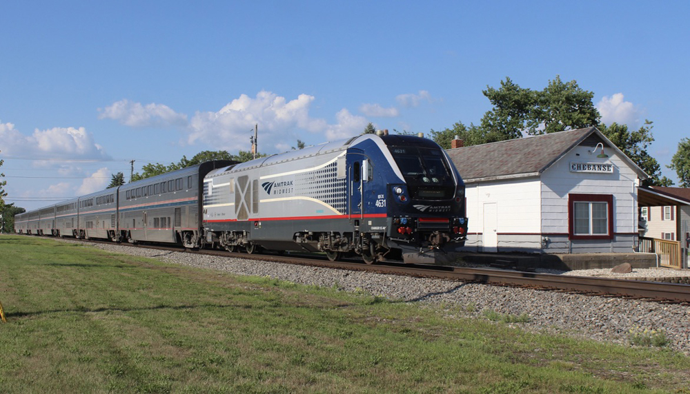 Amtrak train with Charger locomotive and Superliner cars