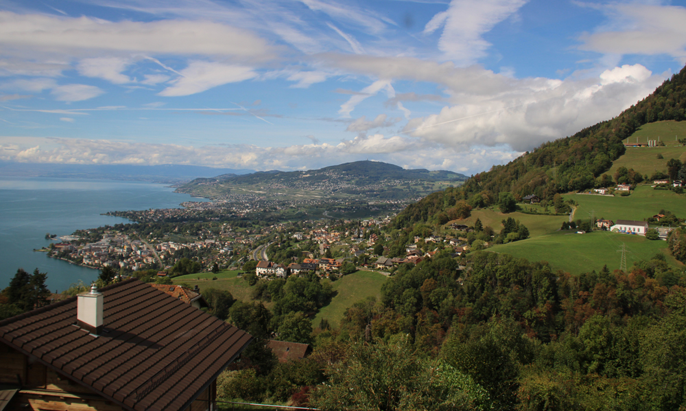 View of city, mountains, and lake