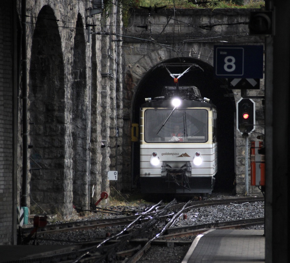 Train emerging from tunnel