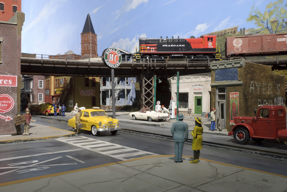 city scene on toy train layout
