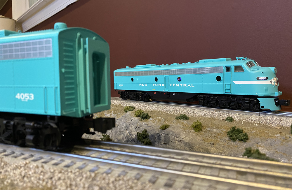 two turquoise engines on layout