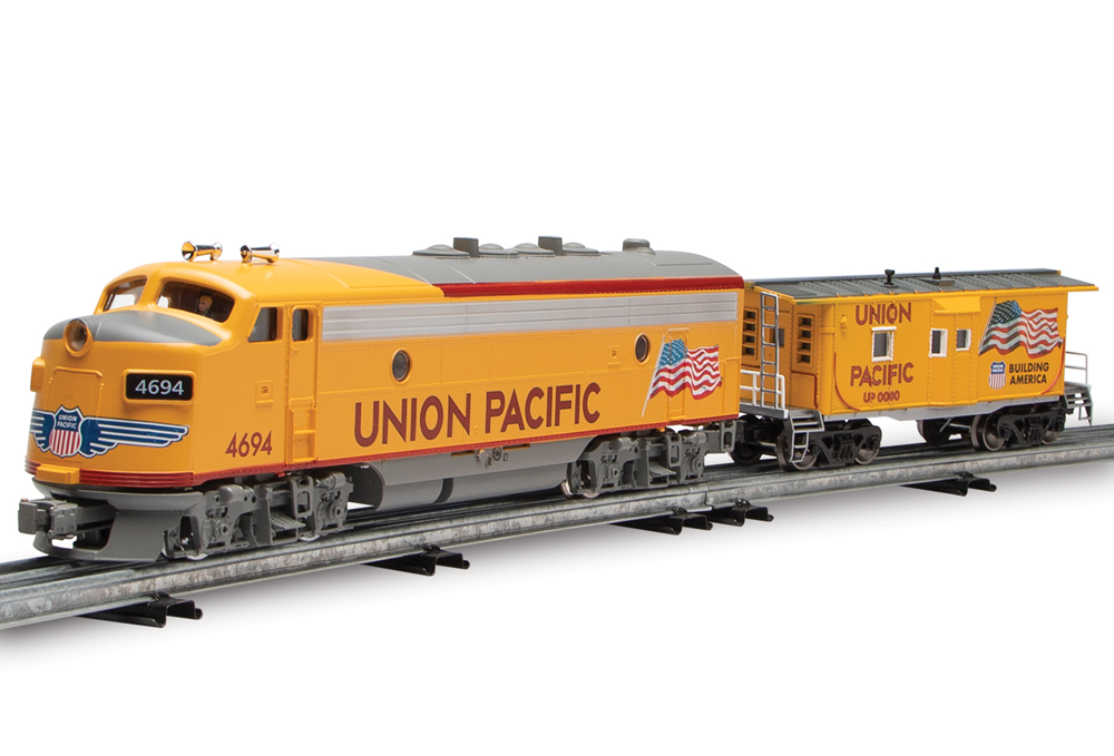 yellow model engine and caboose