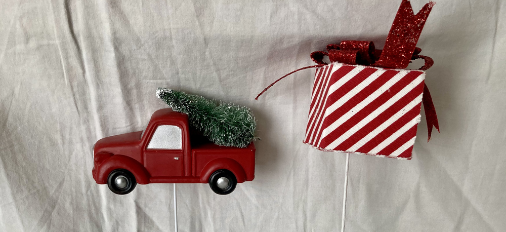 small red truck and Christmas gift floral picks