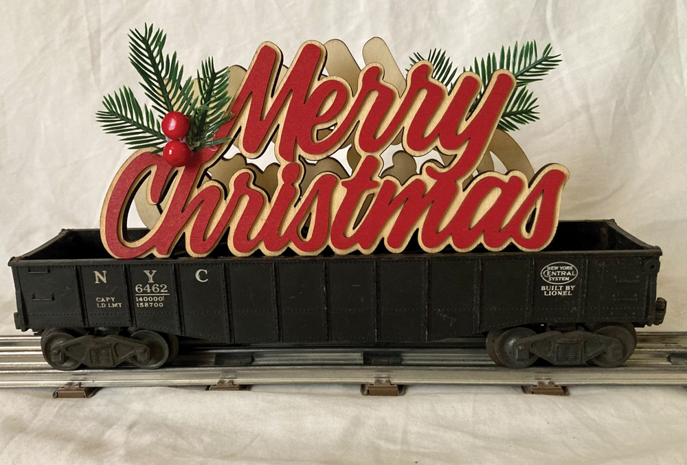 Merry Christmas sign in a black gondola