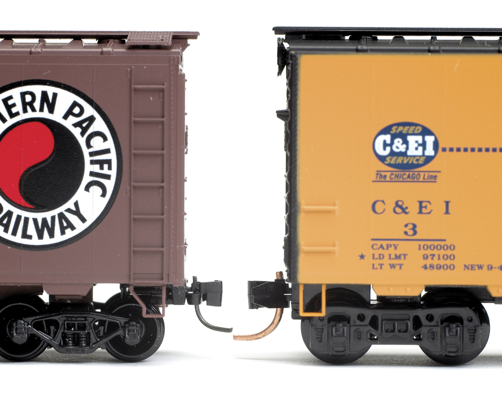 Color image showing N scale freight cars with N and Z couplers.