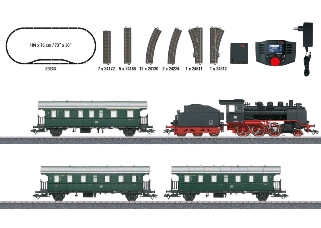 Color photo showing components of HO scale train set based on German prototype.
