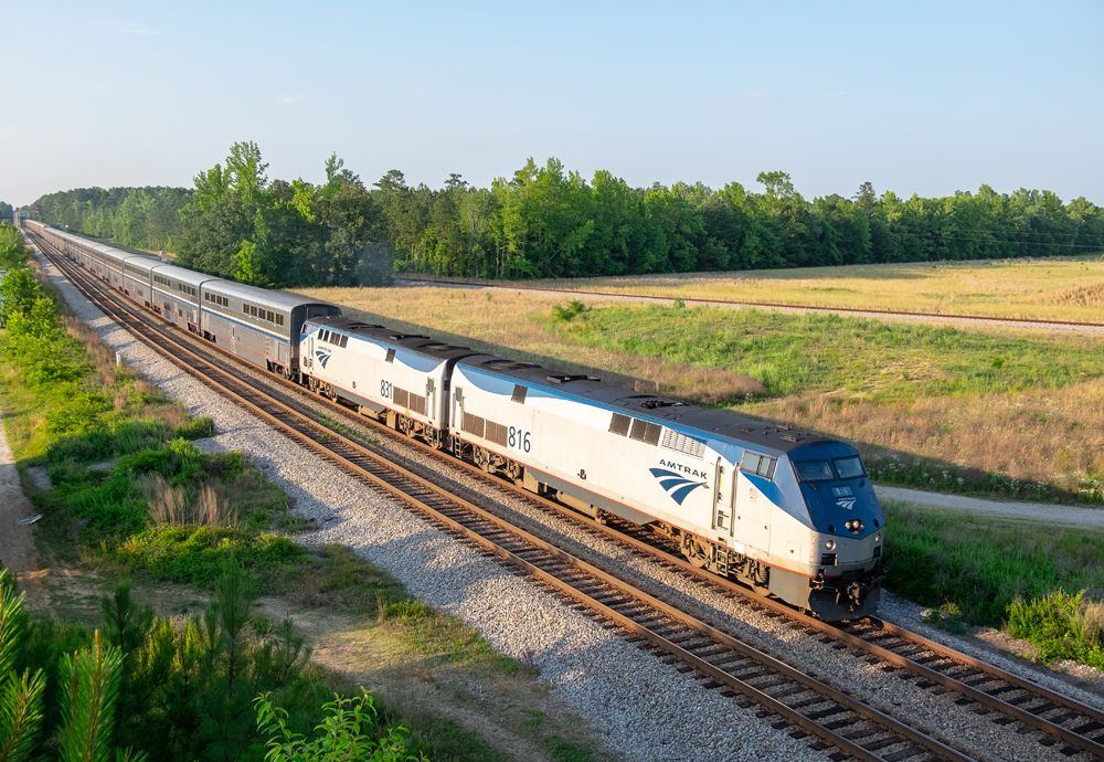 long blue and white passenger train